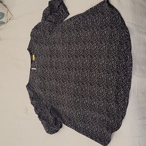 Large, black/white, a-line blouse with puffed; ruched sleeves